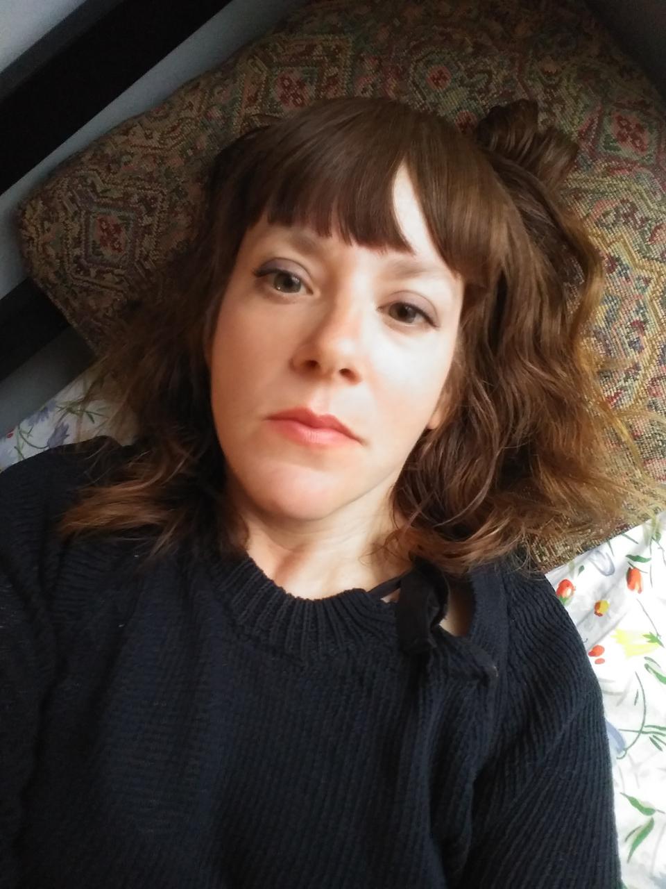 A photo of a woman.