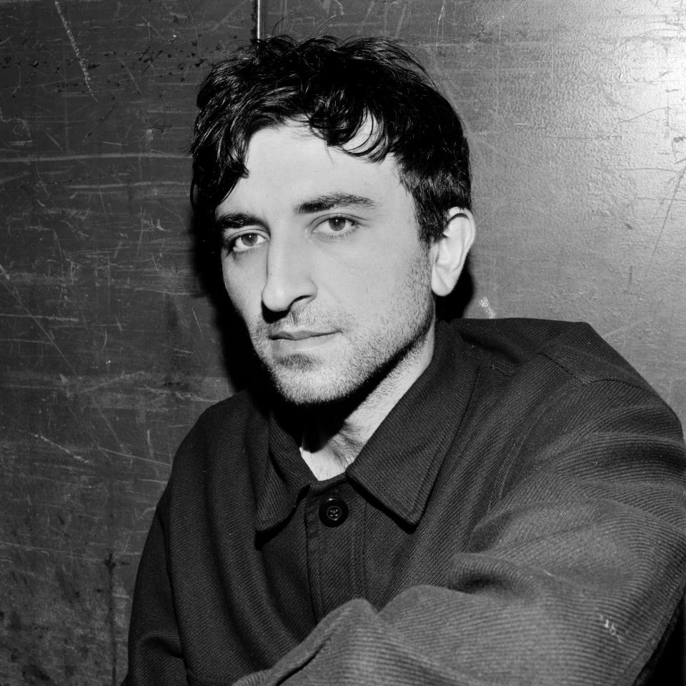A picture of a man looking at the camera.