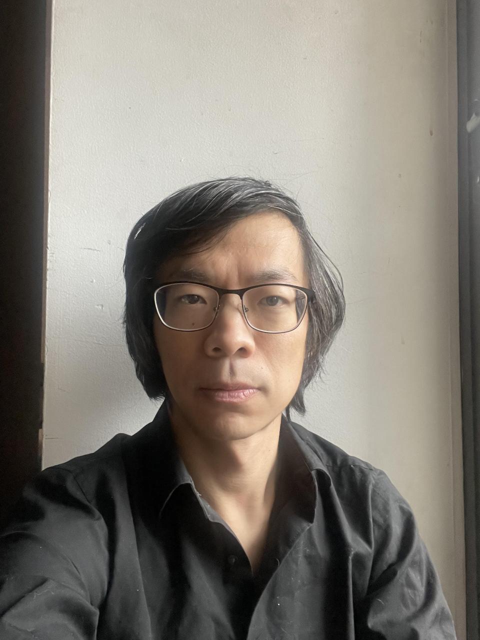 A photo of a man.