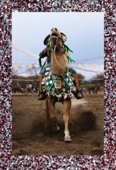 A person riding a horse.