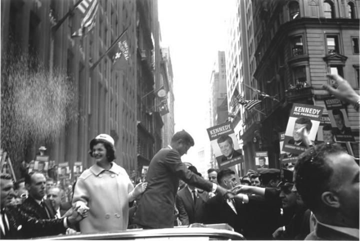 JFK and Jackie O shaking hands with supporters.